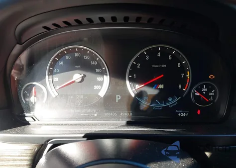 2016 BMW M5 z USA, uszkodzony, nr VIN WBSFV9C52GD595775